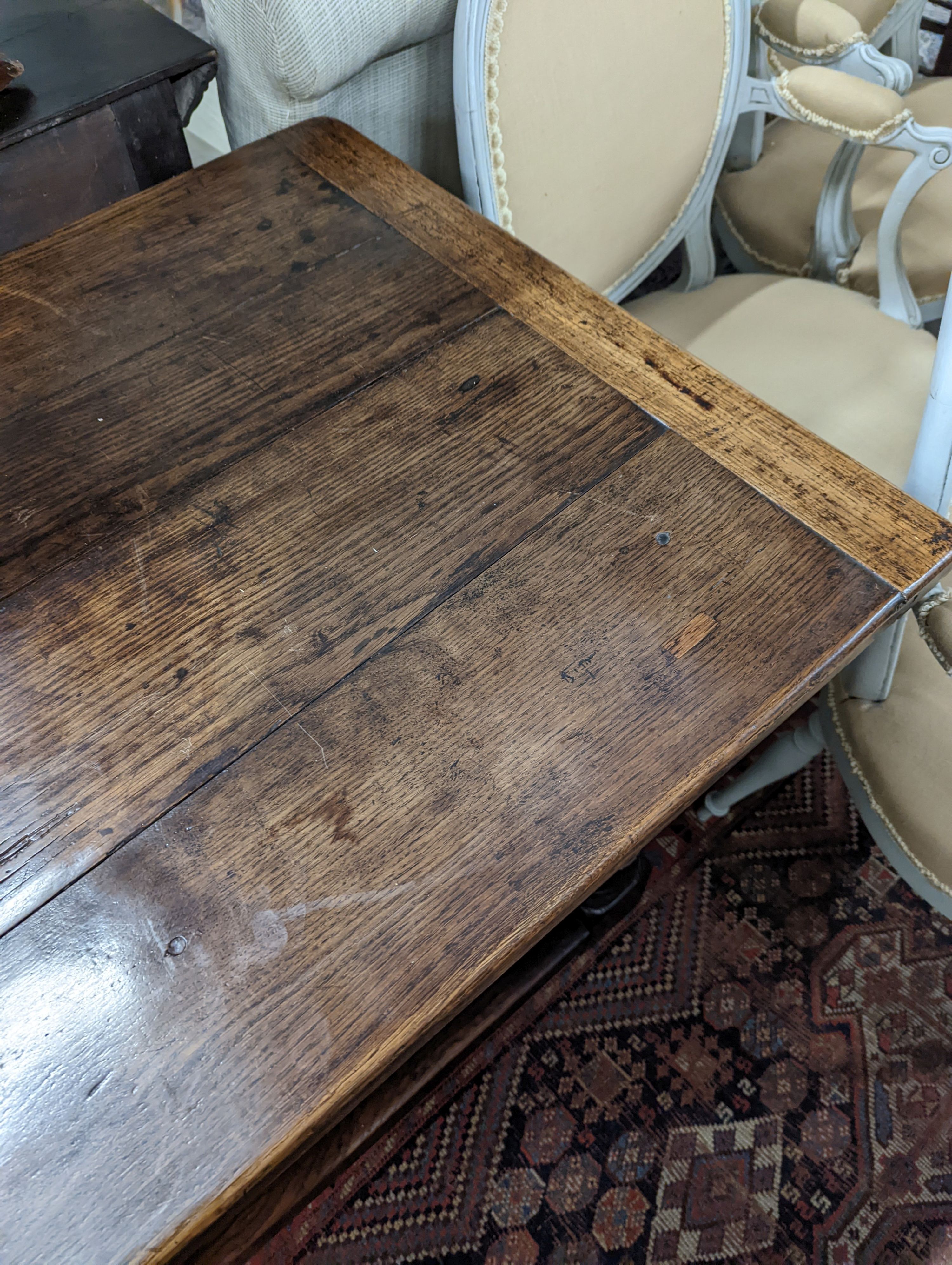 A 17th century rectangular oak refectory dining table, length 167cm, depth 74cm, height 76cm